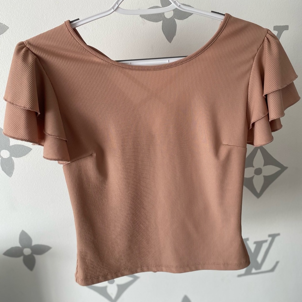 tan color shirt
